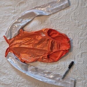 GK child Large orange & white shimmery leotard, dance gymnastics, GUC arm holes